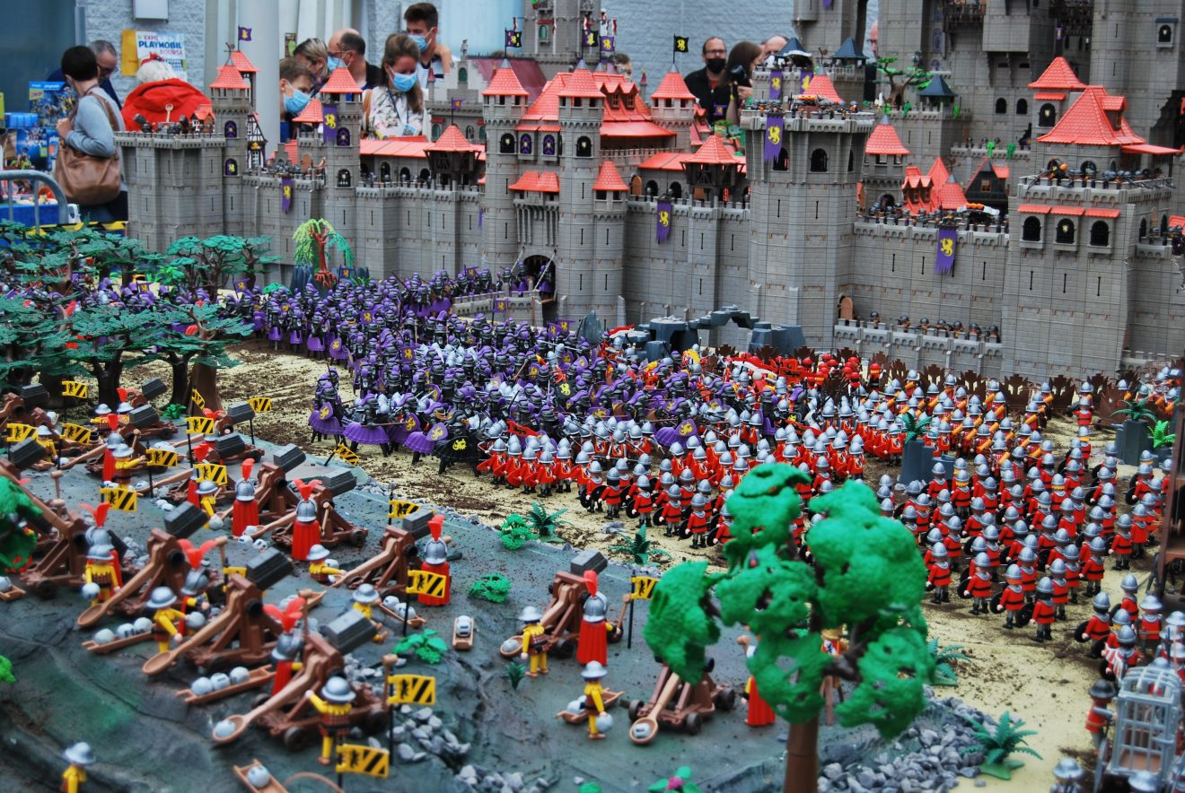 Epic Playmobil castle battle scene built with custom parts