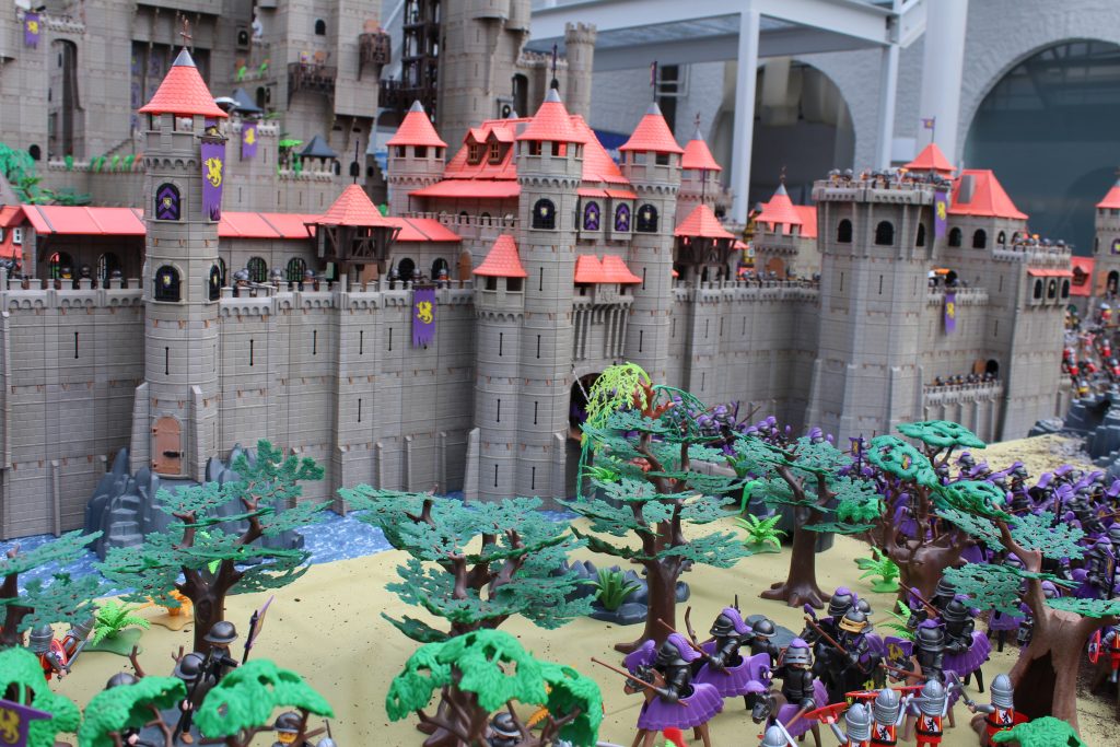 Large Playmobil castle with armies, built with custom parts